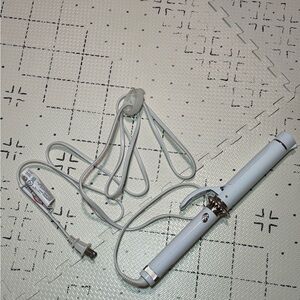 T3 white/ rose gold Twirl curling iron.